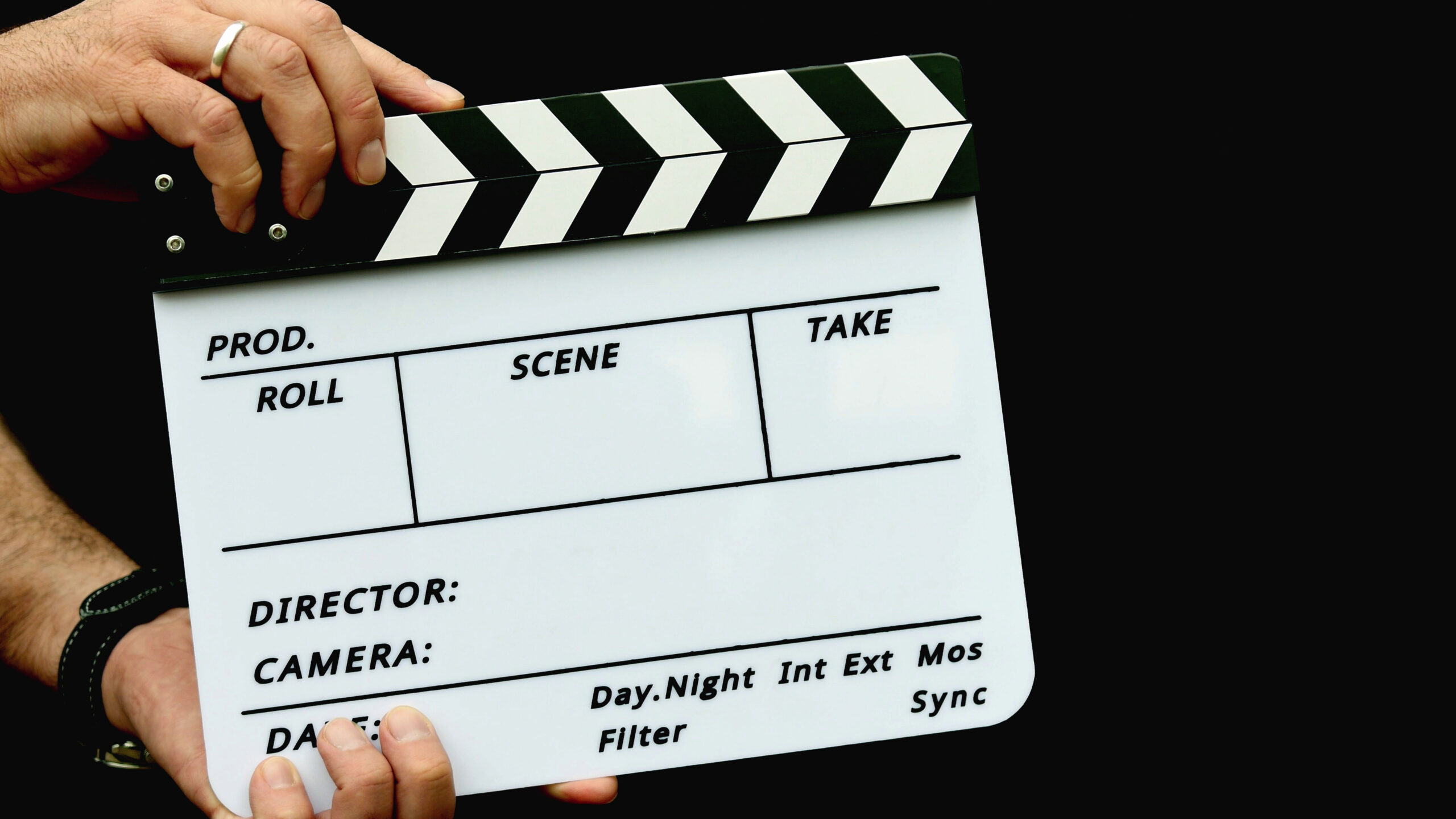 Man Holding Clapper Board